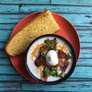 This quick loaded potato chowder has everything you love about a baked potato (bacon, cheese and sour cream) built into a yummy chowder!